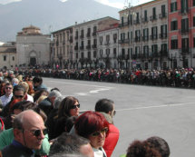 (Our Lady running in the square)