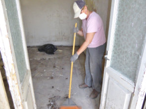 Mopping the bedroom tiles