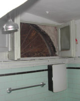 Open up the old bathroom arch and swap rooms with the old kitchen!